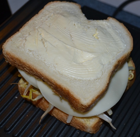 Bean Sprout Grilled Cheese with Spinach and Artichoke Hummus on Texas toast